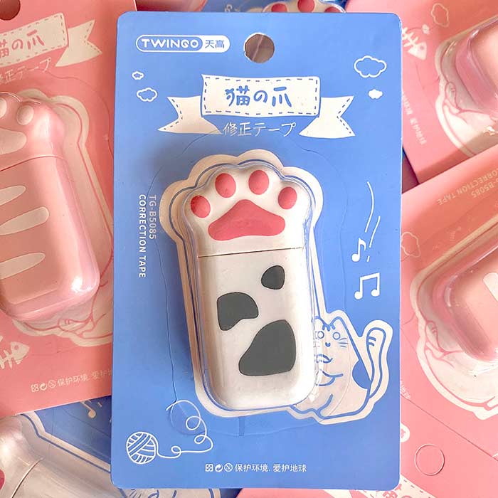 cinta correctora de color blanco en forma de patita de gato