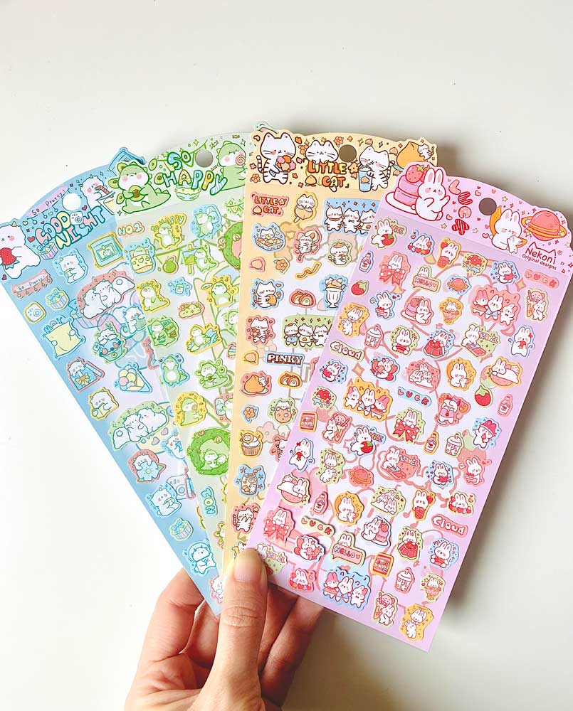 hoja de pegatinas de animales y colores para agendas y libretas, con diseños kawaii