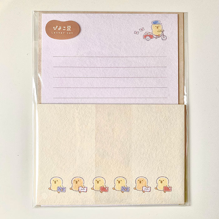 set de cartas y sobres con textura de papeleria japonesa con pollito kawaii