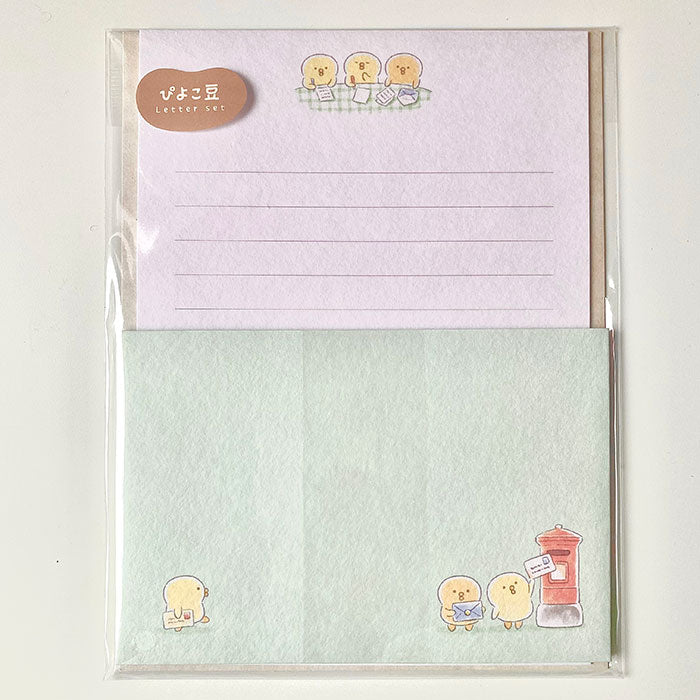 set de cartas y sobres con textura de papeleria japonesa con pollito kawaii