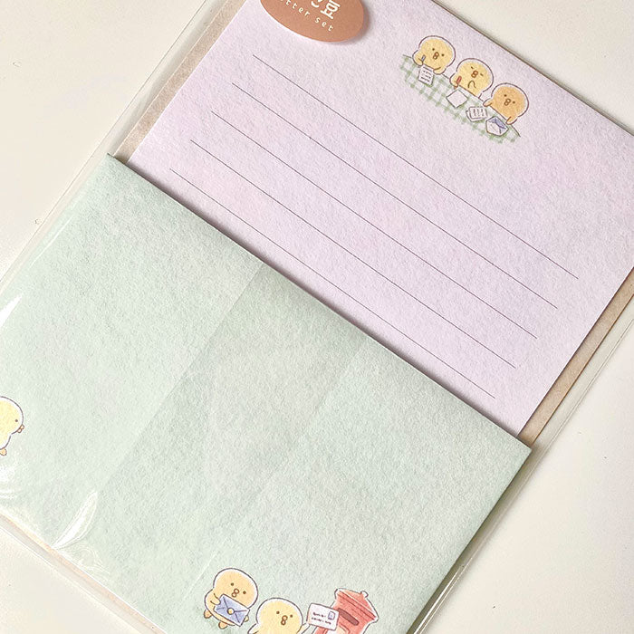 set de cartas y sobres con textura de papeleria japonesa con pollito kawaii