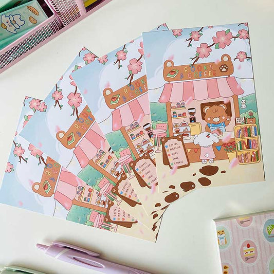 postal kawaii con diseño de cafetería y libros en un día de primavera, ilustración original de papelería bonita