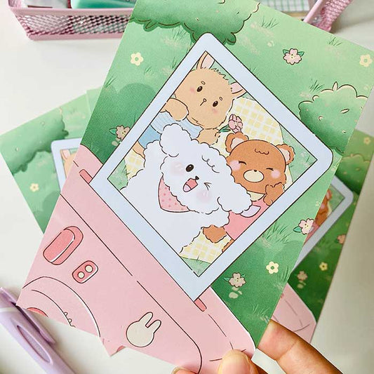 postal kawaii con diseño de fotografía polaroid en un día de primavera, ilustración original de papelería bonita