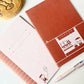 Libreta ejaponesa estilo vintage en tonos marrones con dibujo kawaii