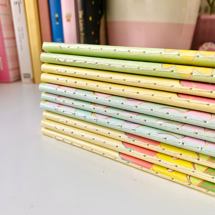 libreta A5 a rayas, con diseño aesthetic y kawaii de flores y animales muy buena calidad